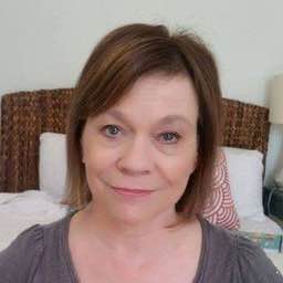 Susan Carley smiling for a portrait